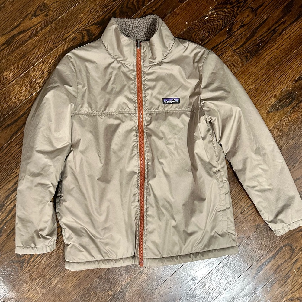 Patagonia light brown/tan kid’s small (no tag) reversible jacket